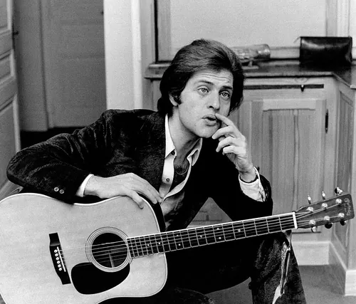 Complétez ces paroles de Joe Dassin : « Elle m’a dit d’aller siffler là‑haut sur la colline, de l’attendre avec un petit bouquet... »
